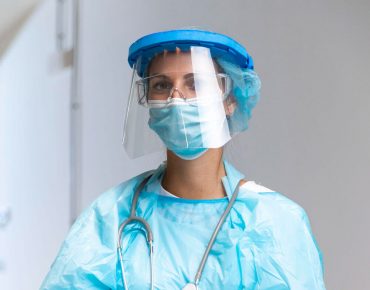front-view-woman-wearing-protective-wear-hospital front-view-woman-wearing-protective-wear-hospital